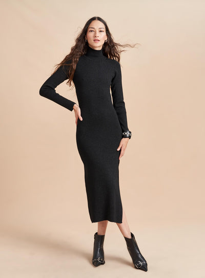 It’s time to shine…with our Fête Dress. Made from a beautifully luxe, lurex yarn so soft, that will have you wondering how you could feel so good in party-ready attire. Pair it back to something equally as fabulous like the Cropped Fête Cardigan for day and add a heel for night. 
