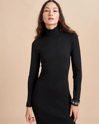 It’s time to shine…with our Fête Dress. Made from a beautifully luxe, lurex yarn so soft, that will have you wondering how you could feel so good in party-ready attire. Pair it back to something equally as fabulous like the Cropped Fête Cardigan for day and add a heel for night. 