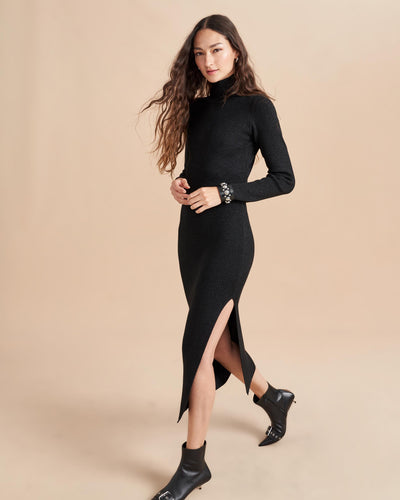 It’s time to shine…with our Fête Dress. Made from a beautifully luxe, lurex yarn so soft, that will have you wondering how you could feel so good in party-ready attire. Pair it back to something equally as fabulous like the Cropped Fête Cardigan for day and add a heel for night. 