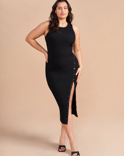 A sure to be staple in your wardrobe come summer or fall, this perfect knit rib dress has a functional button placket down the leg so you can decide whether you want the slit or not. Perfect over boots or sandals, you'll wonder how you lived out without this dress-it-up or dress-it-down dress.