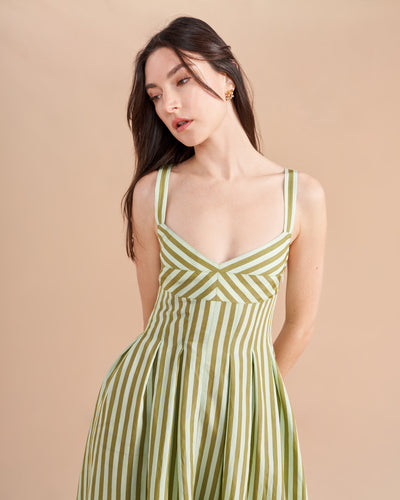 When you want to show off your figure but comfort is Queen, our Madeleine Dress is the perfect marriage of form and function. This 100% cotton dress features a fitted, stretch bodice with a bra-covering, elastic at the back and vertical paneling at the waist for a slimming effect. 