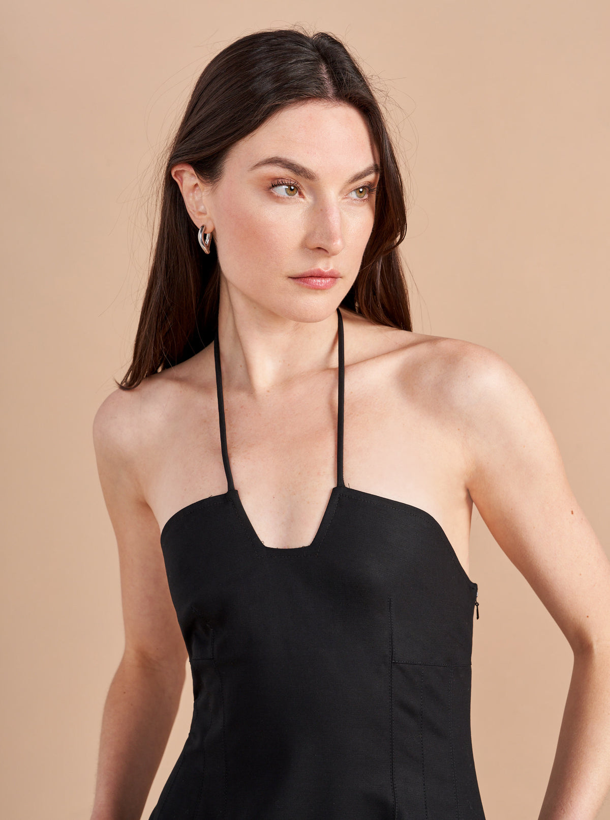 Some dresses are not meant to sit in your closet. This one will call your name so give in to the impulse, zip her up, and paint the town with this cotton stretch, halter neck, fit and flare frock. Dress up to get down. 
