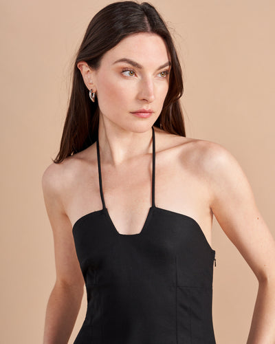 Some dresses are not meant to sit in your closet. This one will call your name so give in to the impulse, zip her up, and paint the town with this cotton stretch, halter neck, fit and flare frock. Dress up to get down. 