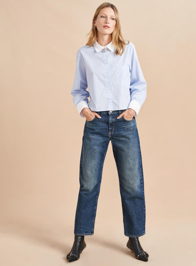 She's a little bit retro, a little bit nostalgic but totally modern. Our newest jean in non-stretch cotton with a slightly curved, barreled leg is a styling dream-it accentuates the waist and exaggerates the leg. Tuck in a tee or pair back to a cropped shirt or sweater but the fun is deciding which shoe to show off.