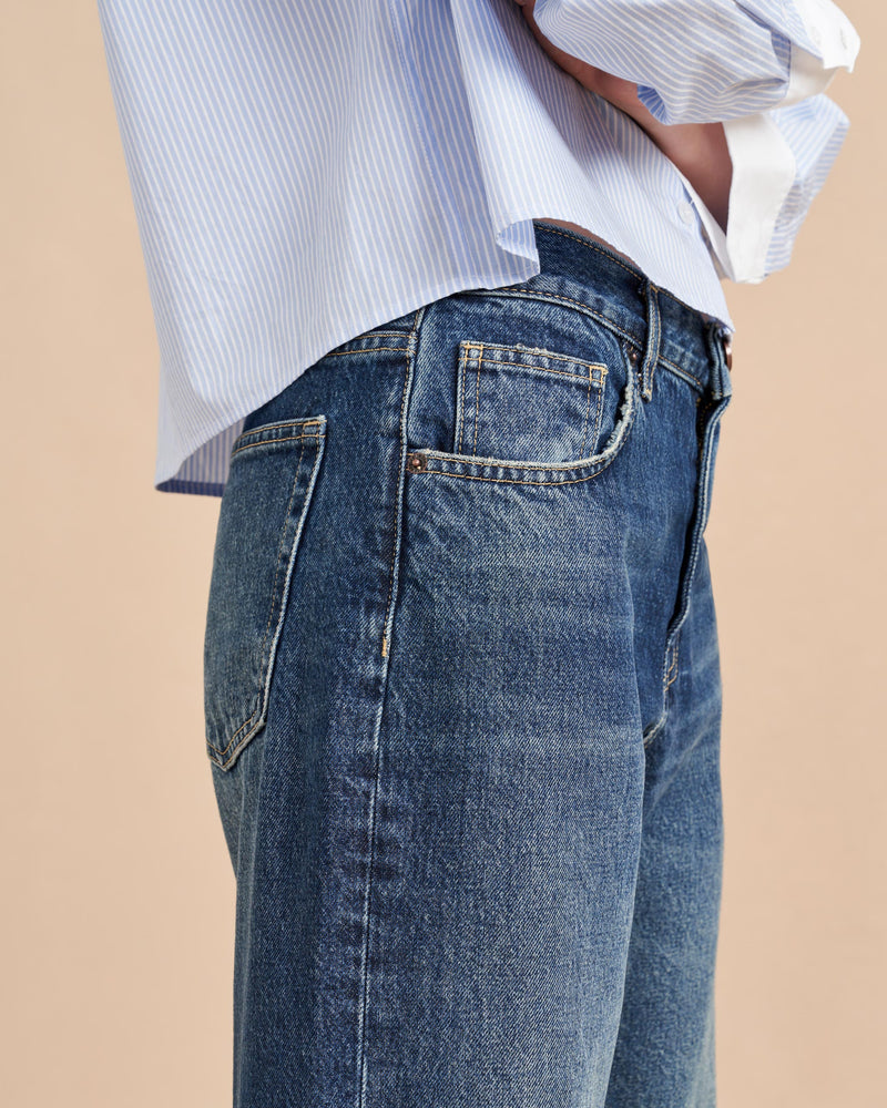 She's a little bit retro, a little bit nostalgic but totally modern. Our newest jean in non-stretch cotton with a slightly curved, barreled leg is a styling dream-it accentuates the waist and exaggerates the leg. Tuck in a tee or pair back to a cropped shirt or sweater but the fun is deciding which shoe to show off.