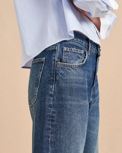 She's a little bit retro, a little bit nostalgic but totally modern. Our newest jean in non-stretch cotton with a slightly curved, barreled leg is a styling dream-it accentuates the waist and exaggerates the leg. Tuck in a tee or pair back to a cropped shirt or sweater but the fun is deciding which shoe to show off.