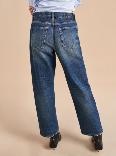 She's a little bit retro, a little bit nostalgic but totally modern. Our newest jean in non-stretch cotton with a slightly curved, barreled leg is a styling dream-it accentuates the waist and exaggerates the leg. Tuck in a tee or pair back to a cropped shirt or sweater but the fun is deciding which shoe to show off.