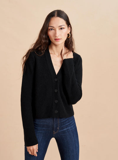This is it. This is your everyday, never-without, take-with-you-everywhere cardigan that will always have your back. Deliciously ribbed cashmere and slightly cropped silhouette means you need one in every color for tous les jours. 