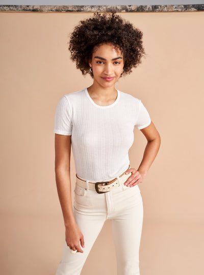 Our tee collection would not be complete without this tried and true French pointelle classic. Made from the softest viscose blend, this tee features scallop details at the neck and hem with pointelle lines throughout. C'est magnifique!