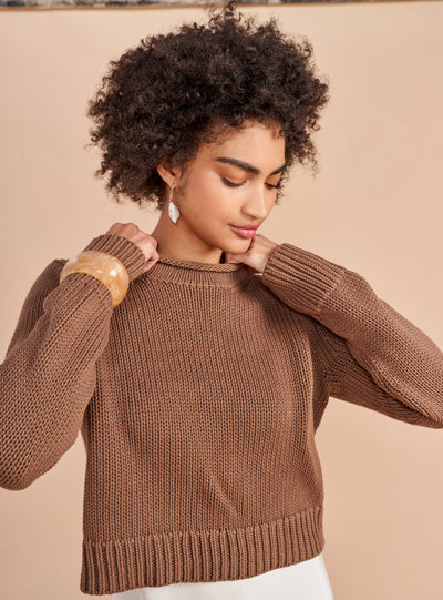 Our infamous Mini Marina Sweater, now in solid colors so get on board whether you are in the mood for all over stripes or not in our best-selling, chunky, 100% cotton sweater with our signature Marina rollneck that you know and love us for.