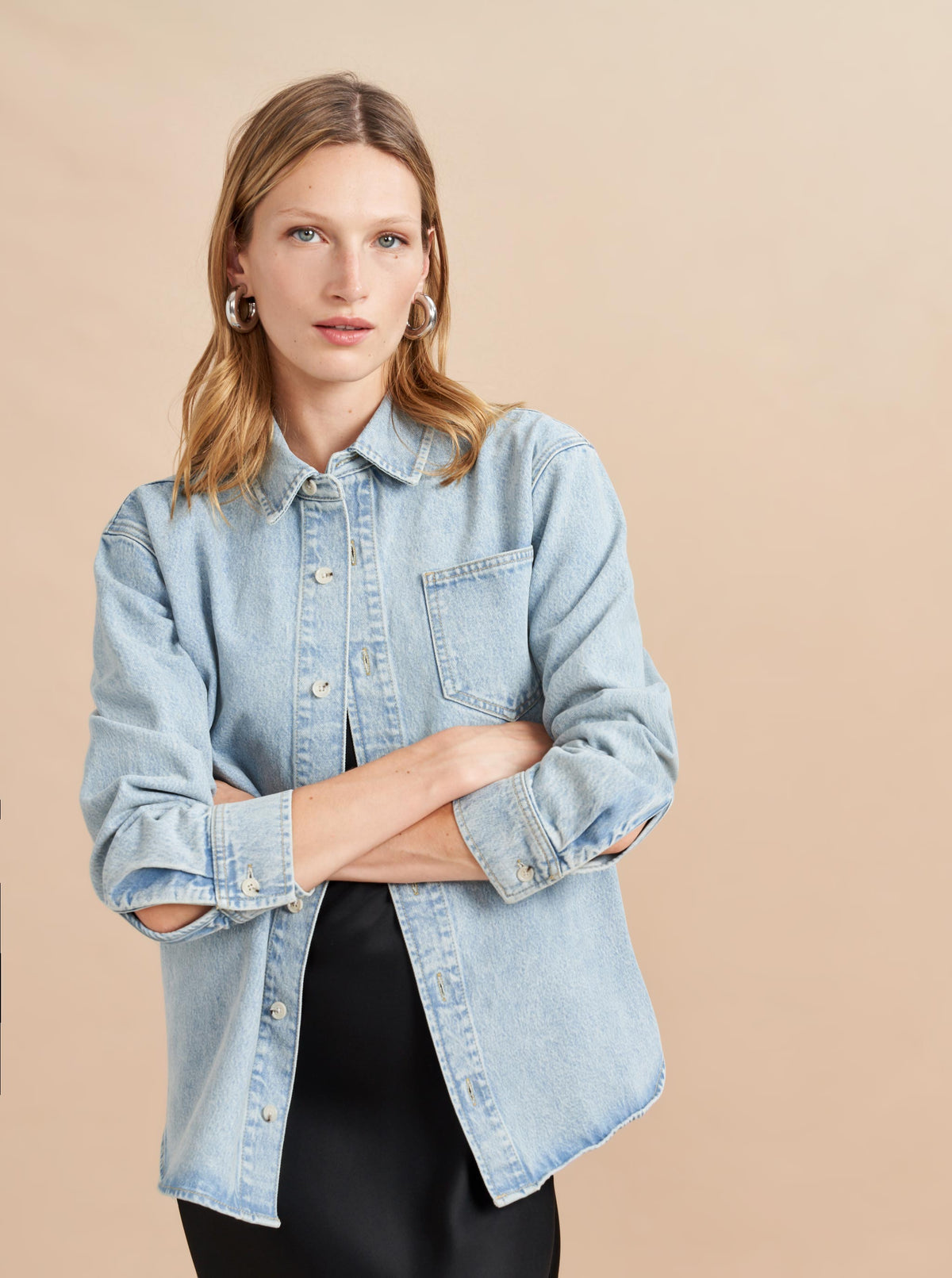 Denim just makes everything better and a classic, denim button up is one of those pieces. When not wearing it back to other jeans, be sure to style it with your favorite dress or trouser for a hint of the unexpected. And just like your favorite jeans, this shirt will get softer and cooler with each wear.