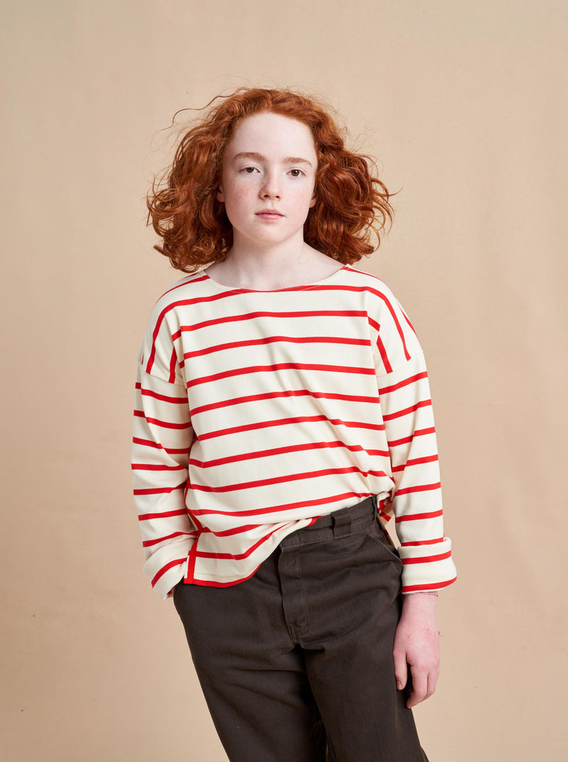 The epitome of quintessential Breton style, this long sleeve tee does it all in 100% super soft cream cotton with poppy stripes.