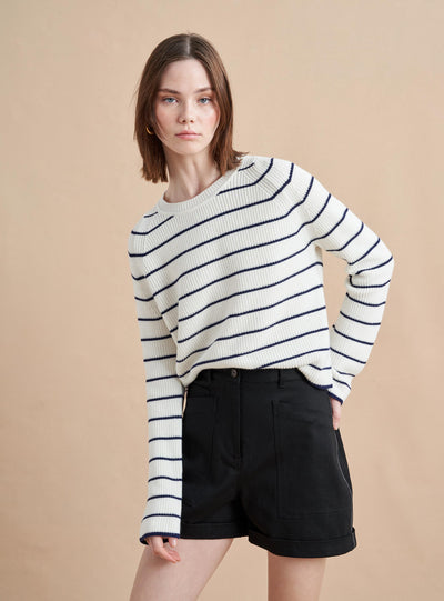 An allover stripe classic in a supremely-soft, easy cotton blend. This cropped yet boxy sweater is perfect for layering, holds its own under a suit and right at home with our newest denim. 