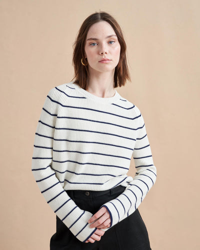 An allover stripe classic in a supremely-soft, easy cotton blend. This cropped yet boxy sweater is perfect for layering, holds its own under a suit and right at home with our newest denim. 