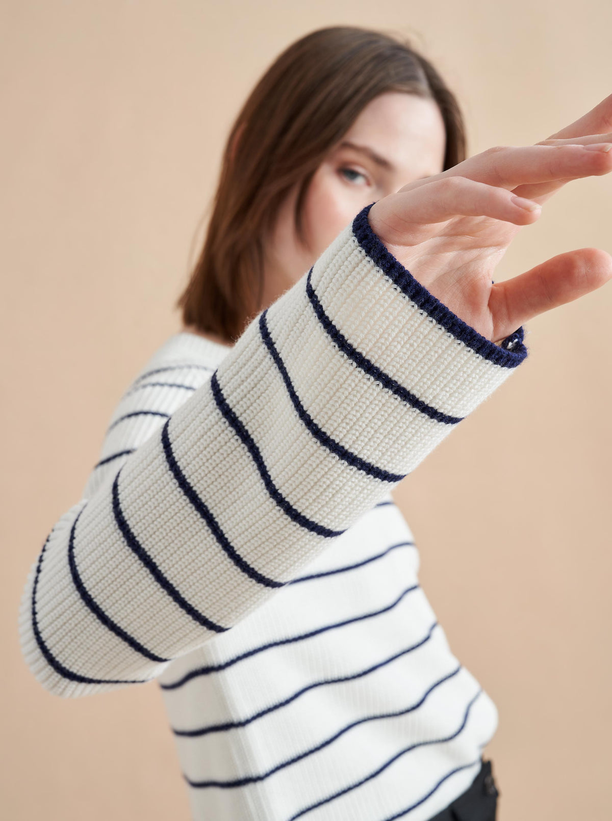 An allover stripe classic in a supremely-soft, easy cotton blend. This cropped yet boxy sweater is perfect for layering, holds its own under a suit and right at home with our newest denim. 