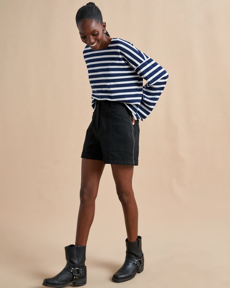 Our new take on the Breton tee, inspired by the one and only, Charlotte Gainsbourg. Cut from our signature lean lines delicious cotton, with a roomier fit, cropped body and classic drop shoulder.