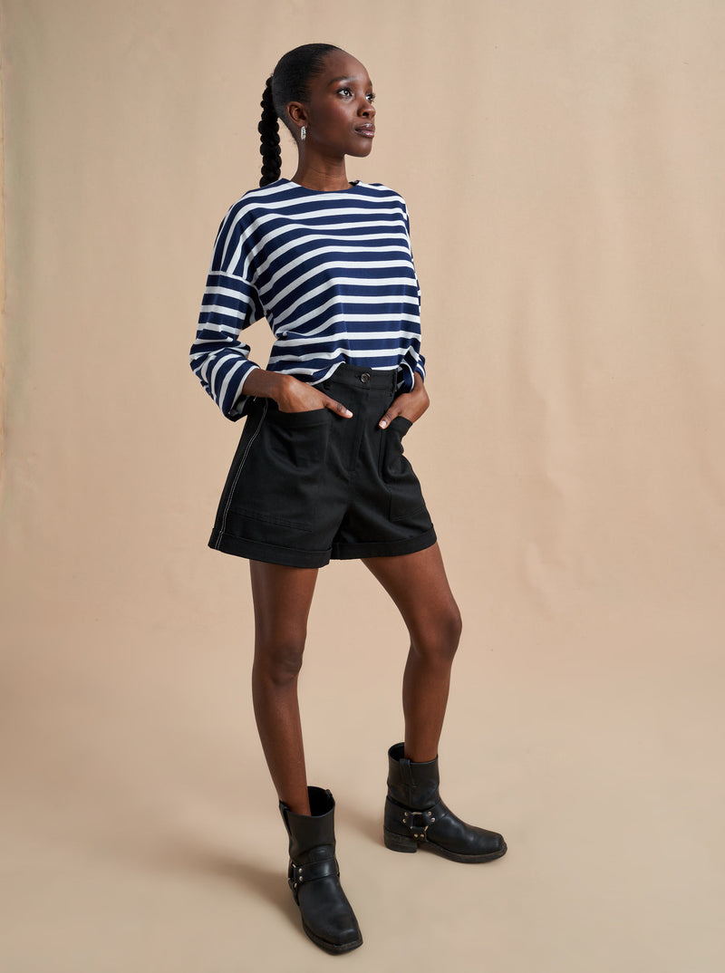 Our new take on the Breton tee, inspired by the one and only, Charlotte Gainsbourg. Cut from our signature lean lines delicious cotton, with a roomier fit, cropped body and classic drop shoulder.