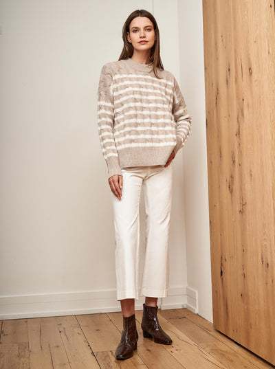 Get on board with our oatmeal & cream stripe, cable wool-cashmere sweater. Comfort and style, not mutually exclusive.