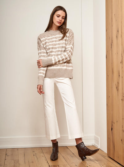 Get on board with our oatmeal & cream stripe, cable wool-cashmere sweater. Comfort and style, not mutually exclusive.