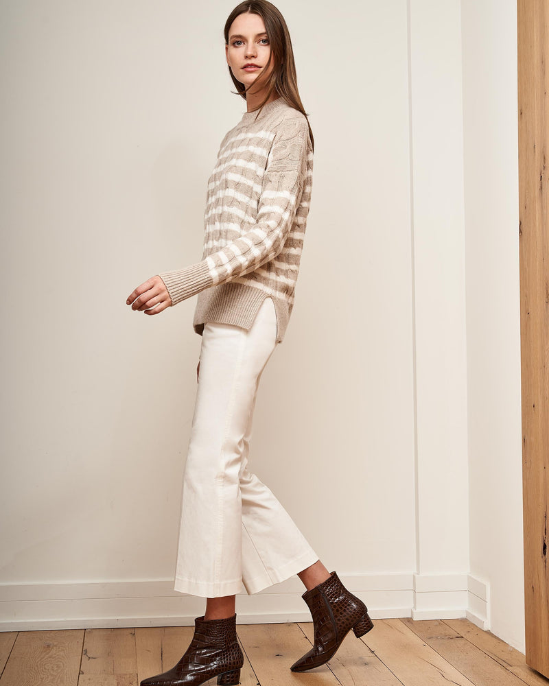 Get on board with our oatmeal & cream stripe, cable wool-cashmere sweater. Comfort and style, not mutually exclusive.