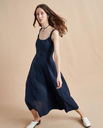 Georgia might be the only dress on your mind when you think about what to wear. This easy, slip-of-a-thing is actually fitted in all the right places with a smocked back panel for ease, silk godets for the perfect drape and delicate, raw edge details on the straps and vertical seams. Pair with heels or flats, but you will be the one leaving an impression.