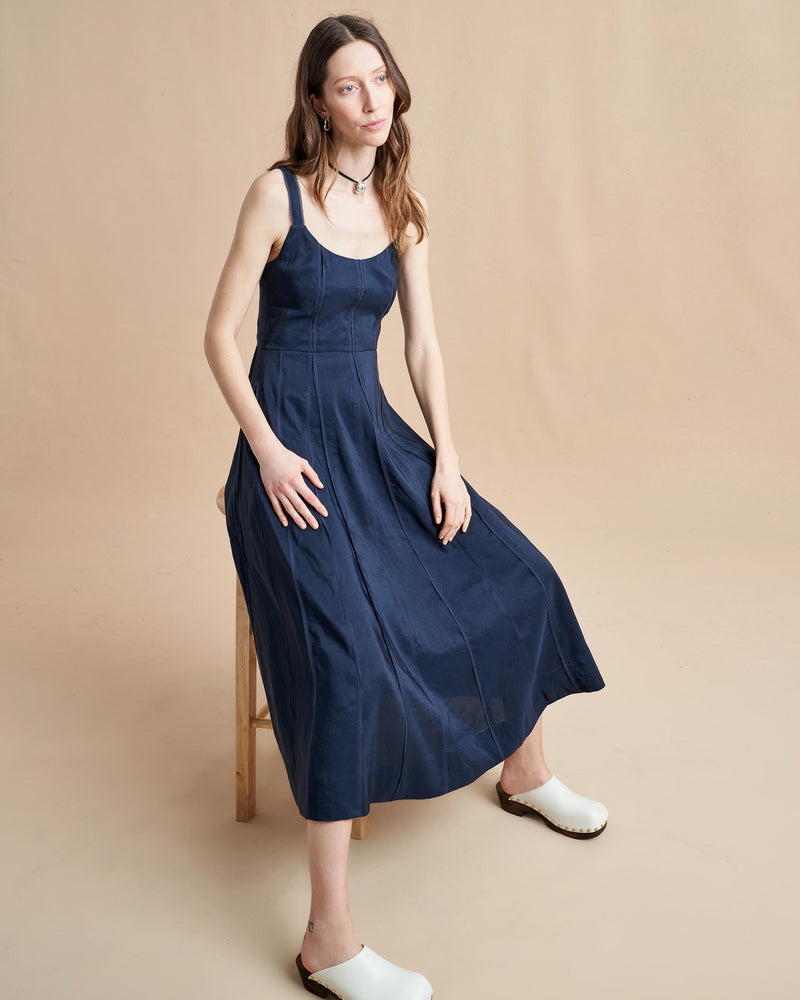 Georgia might be the only dress on your mind when you think about what to wear. This easy, slip-of-a-thing is actually fitted in all the right places with a smocked back panel for ease, silk godets for the perfect drape and delicate, raw edge details on the straps and vertical seams. Pair with heels or flats, but you will be the one leaving an impression.