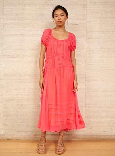 The most perfect dress for almost anything, our Isabelle Dress is seasonless and limitless in style. Wear it cinched or loose with the adjustable drawstring featuring fringe tassels and the removable slip means you are as covered as you want to be in this fluid, chiffon, light-as-air, must-have-in-your-closet-right-now dress. For a sexier look, ditch the slip and slip it over our Kiki Set. 