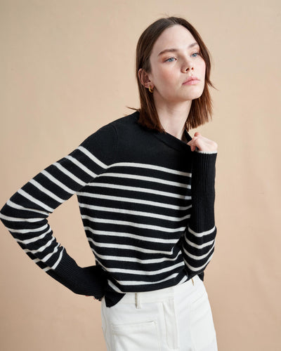 She's back and better than ever! We've brought back our signature, Lean Lines Sweater. The ultimate, year-round essential in 100% lightweight cashmere, the piece you hope no one will notice you've worn three days in a row. You can thank us later.