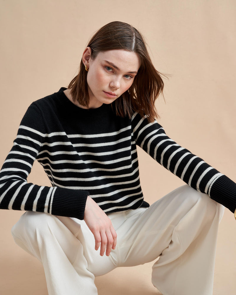 She's back and better than ever! We've brought back our signature, Lean Lines Sweater. The ultimate, year-round essential in 100% lightweight cashmere, the piece you hope no one will notice you've worn three days in a row. You can thank us later.