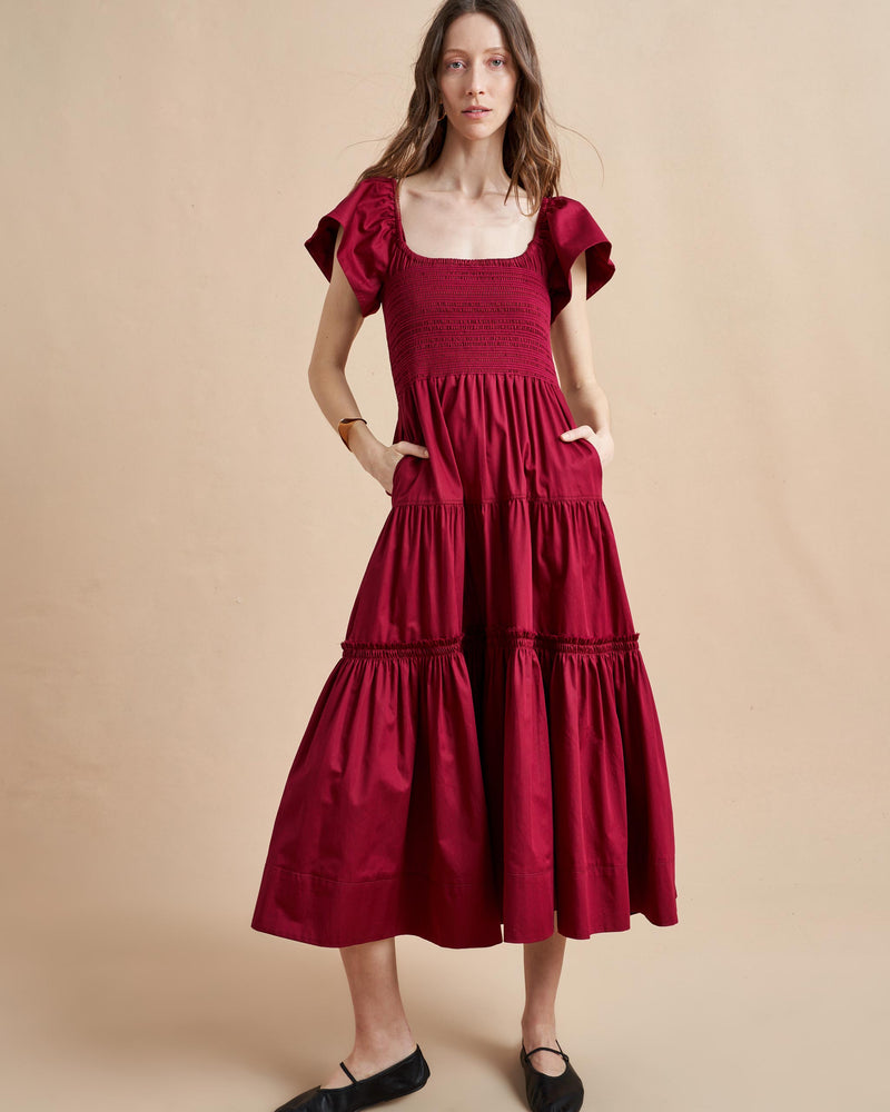 The ideal transitional dress in light cotton, to be worn on or off-the-shoulder with spaghetti straps and smocked bodice. The epitome of day-to-night, wear it with flats for day or pair with heels for an easy, breezy evening look. 