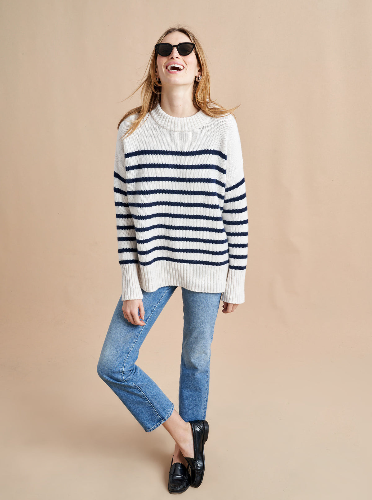 Get on board with our cream with navy stripe 7-ply wool-cashmere sweater. Comfort and style, not mutually exclusive.