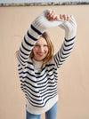 Get on board with our cream with navy stripe 7-ply wool-cashmere sweater. Comfort and style, not mutually exclusive.