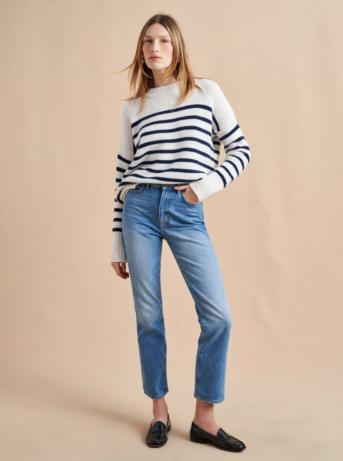 Get on board with our cream with navy stripe 7-ply wool-cashmere sweater. Comfort and style, not mutually exclusive.