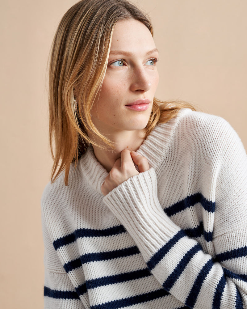 Get on board with our cream with navy stripe 7-ply wool-cashmere sweater. Comfort and style, not mutually exclusive.