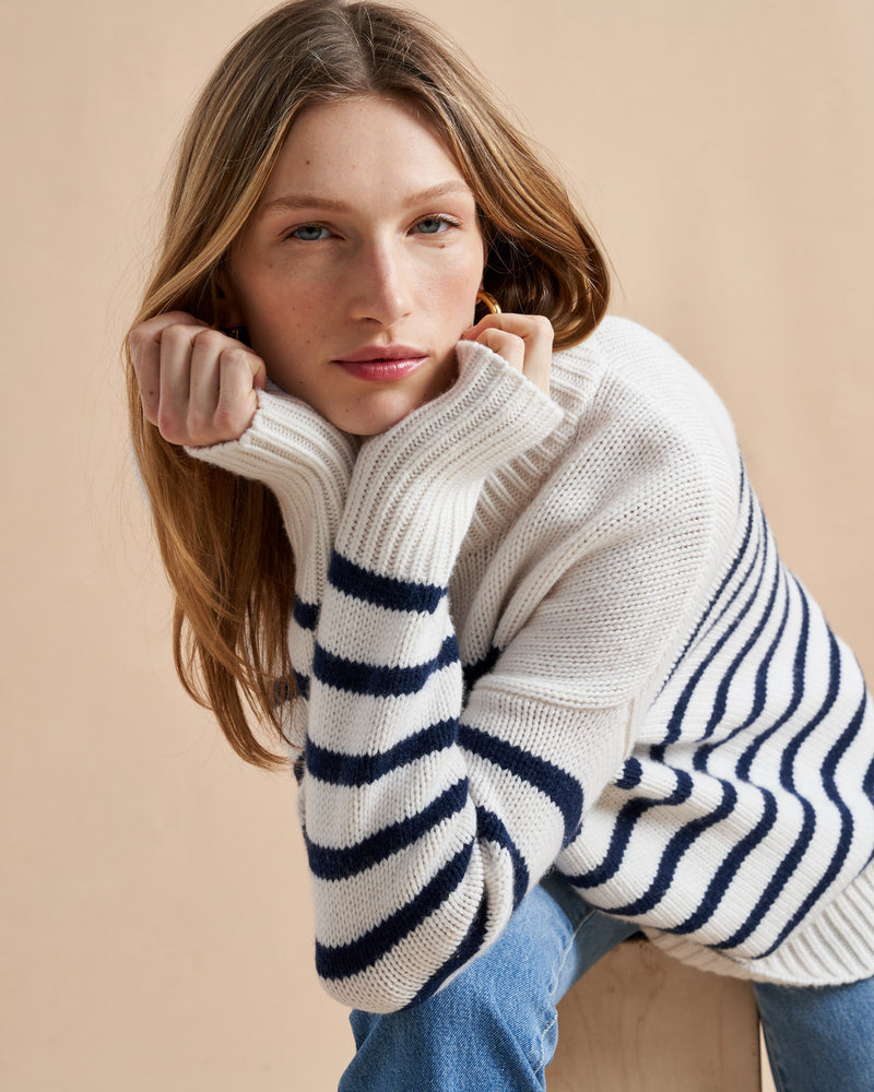 Get on board with our cream with navy stripe 7-ply wool-cashmere sweater. Comfort and style, not mutually exclusive.