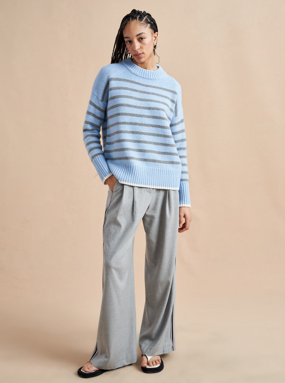 Get on board with our light blue with grey stripe 7-ply wool-cashmere sweater. Comfort and style, not mutually exclusive.