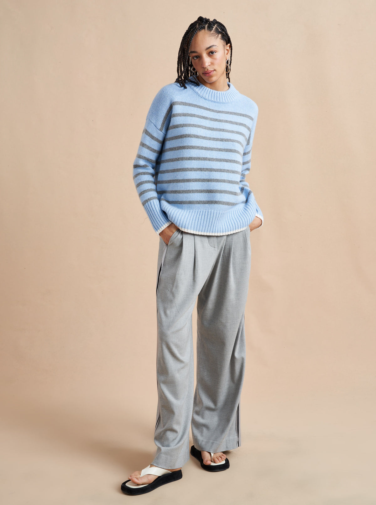 Get on board with our light blue with grey stripe 7-ply wool-cashmere sweater. Comfort and style, not mutually exclusive.