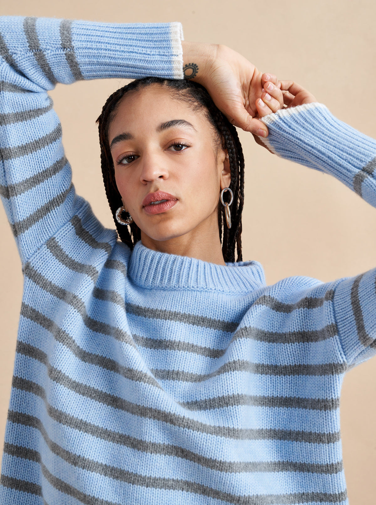 Get on board with our light blue with grey stripe 7-ply wool-cashmere sweater. Comfort and style, not mutually exclusive.