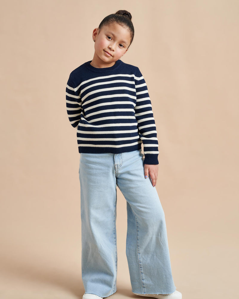 Made especially for our littlest (and mightiest) generation, our Marini Sweater is a shrunken down version of our best-selling adult Marin Sweater, now available for kids. We swapped our signature wool/cashmere blend to 100% cotton for kid’s comfort and ease so the only cycle you need to remember is throw on, throw off, laundry, repeat.