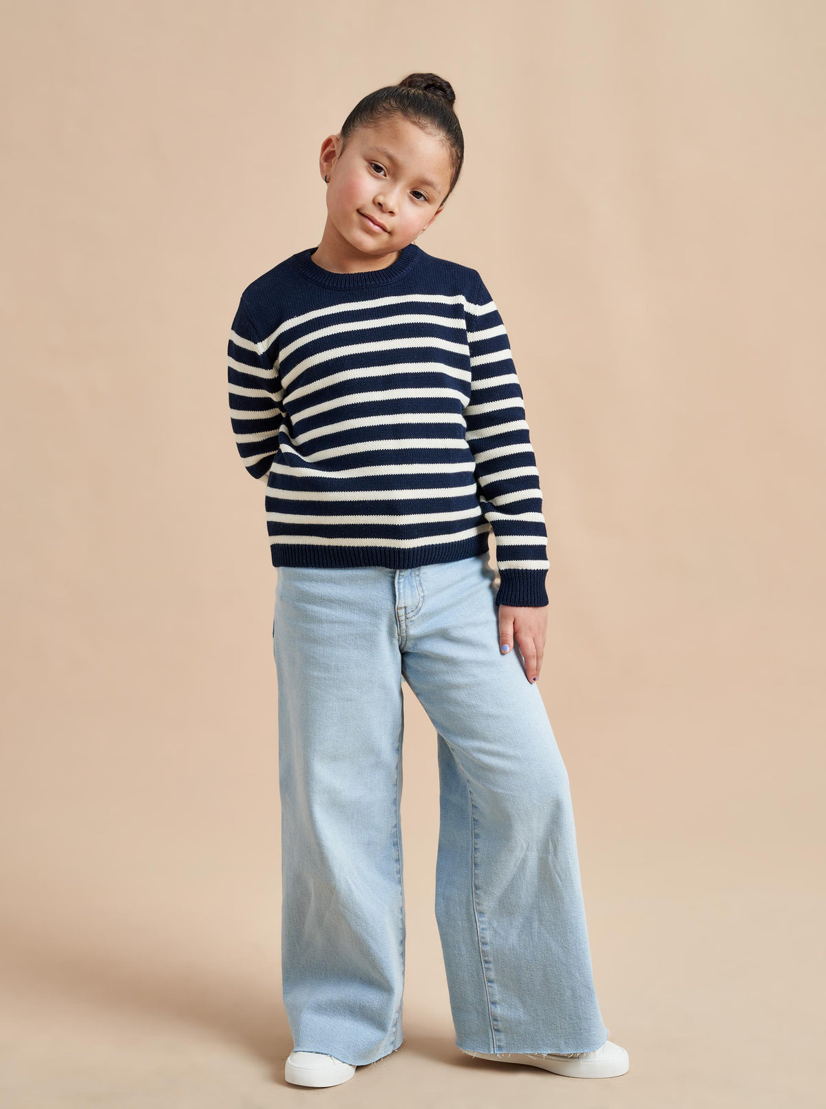 Made especially for our littlest (and mightiest) generation, our Marini Sweater is a shrunken down version of our best-selling adult Marin Sweater, now available for kids. We swapped our signature wool/cashmere blend to 100% cotton for kid’s comfort and ease so the only cycle you need to remember is throw on, throw off, laundry, repeat.