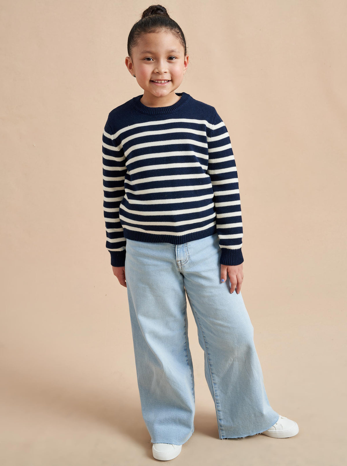 Made especially for our littlest (and mightiest) generation, our Marini Sweater is a shrunken down version of our best-selling adult Marin Sweater, now available for kids. We swapped our signature wool/cashmere blend to 100% cotton for kid’s comfort and ease so the only cycle you need to remember is throw on, throw off, laundry, repeat.