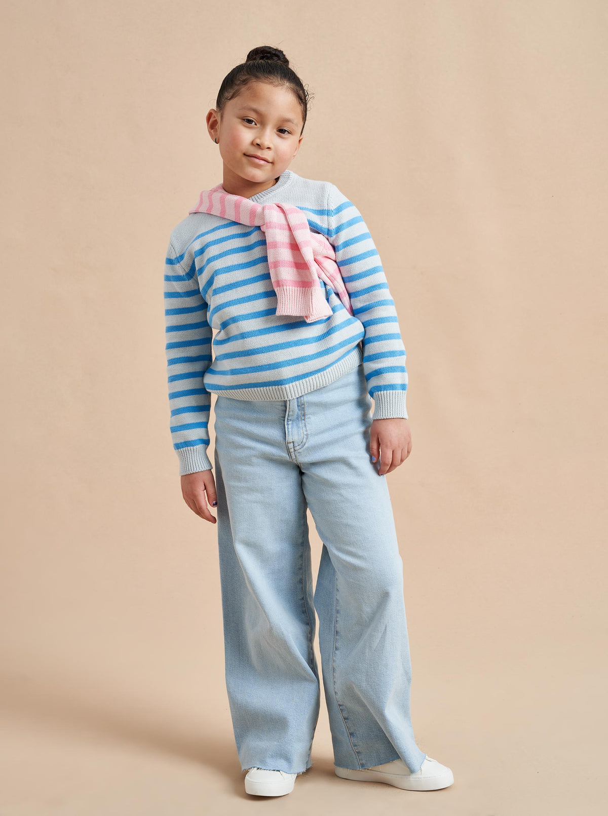 Made especially for our littlest (and mightiest) generation, our Marini Sweater is a shrunken down version of our best-selling adult Marin Sweater, now available for kids. We swapped our signature wool/cashmere blend to 100% cotton for kid’s comfort and ease so the only cycle you need to remember is throw on, throw off, laundry, repeat.