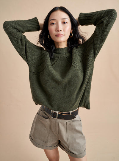 Max for maxiumum softness in 100% recycled cashmere, this oversized sweater with raglan sleeves is max on details like directional ribbing near the armholes and tops of the sleeves with mixed stitches on the body and sleeves. More is more.