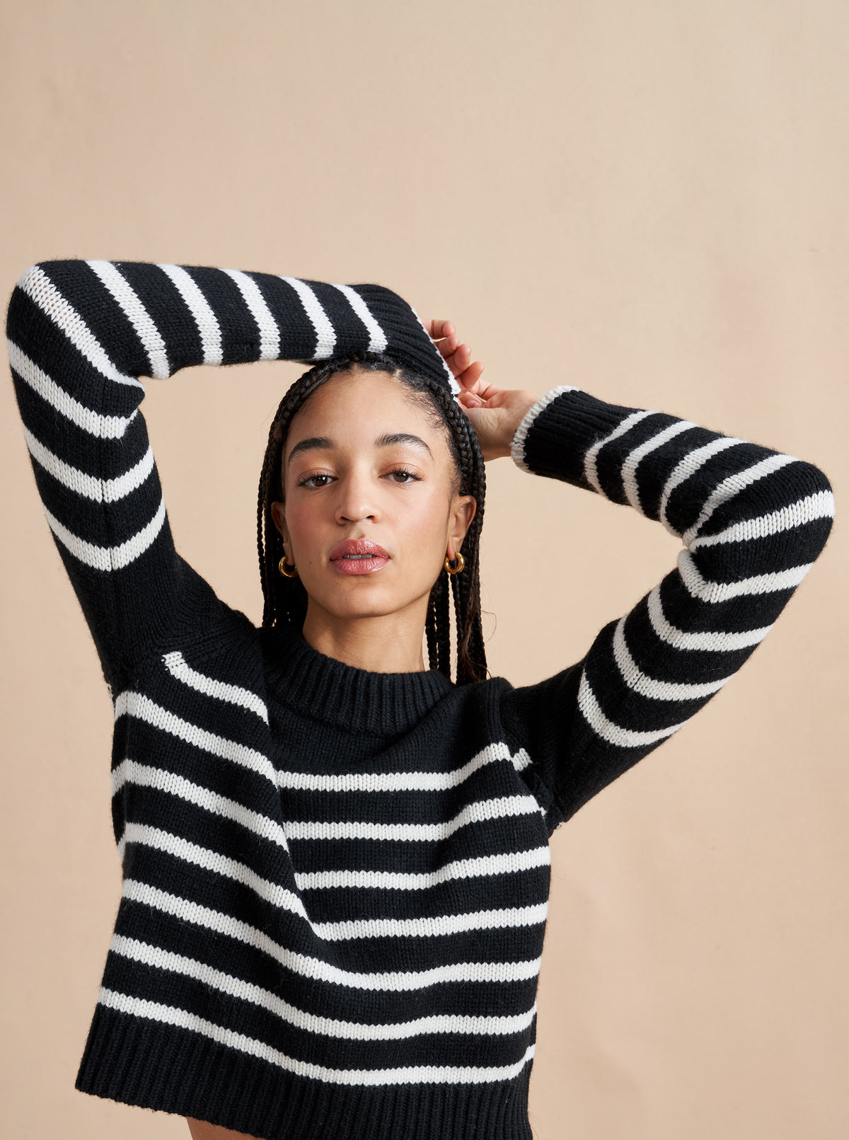 Get on board with our black with cream stripe, 7-ply wool-cashmere sweater, shrunken and slightly cropped, but as always, comfort and style not mutually exclusive.