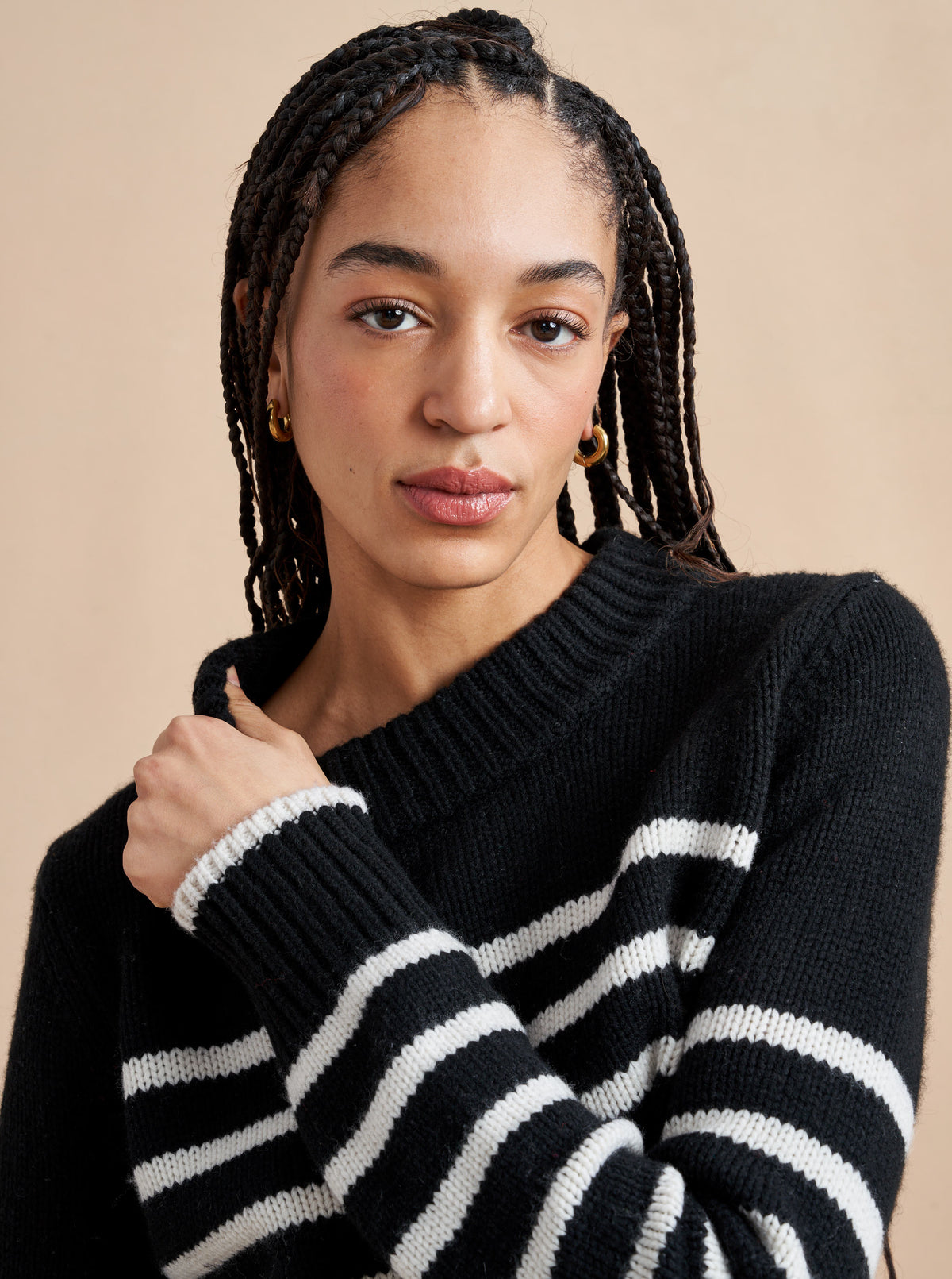 Get on board with our black with cream stripe, 7-ply wool-cashmere sweater, shrunken and slightly cropped, but as always, comfort and style not mutually exclusive.