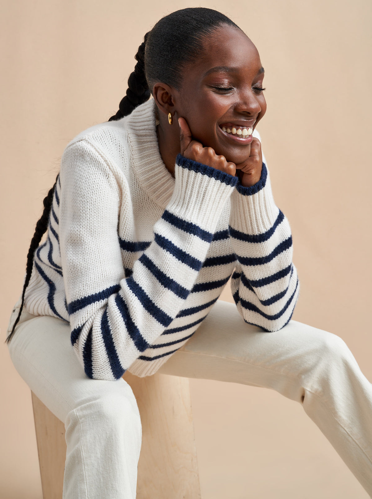 Get on board with our cream with navy stripe, 7-ply wool-cashmere sweater, shrunken and slightly cropped, but as always, comfort and style not mutually exclusive.