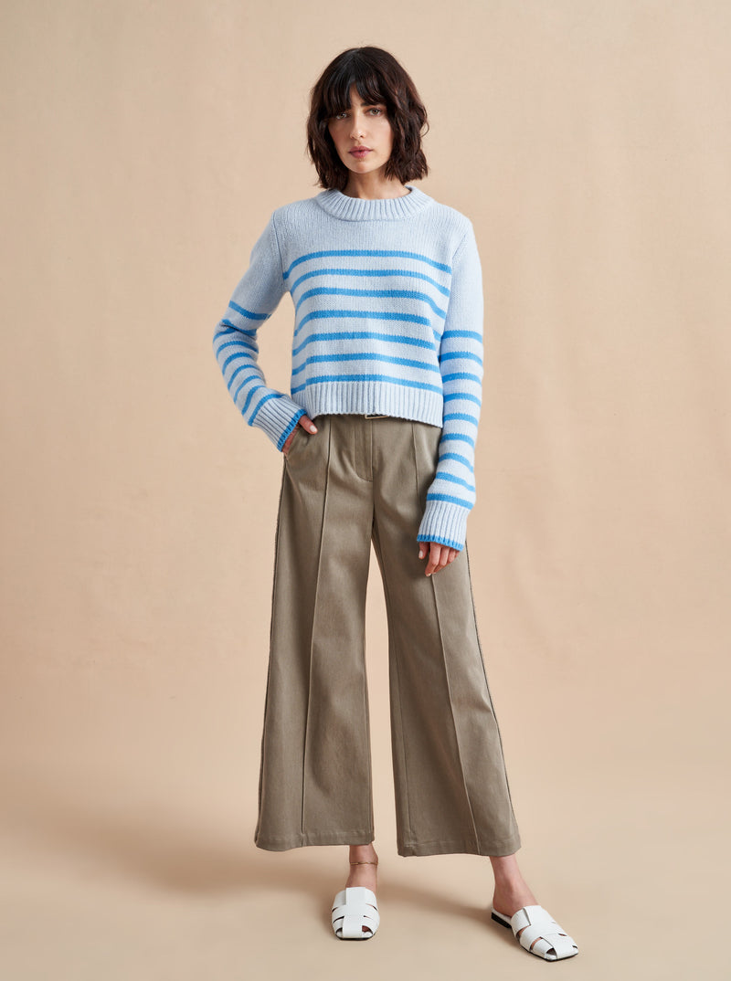 Get on board with our pale blue with tonal blue stripes, 7-ply wool-cashmere sweater, shrunken and slightly cropped, but as always, comfort and style not mutually exclusive.