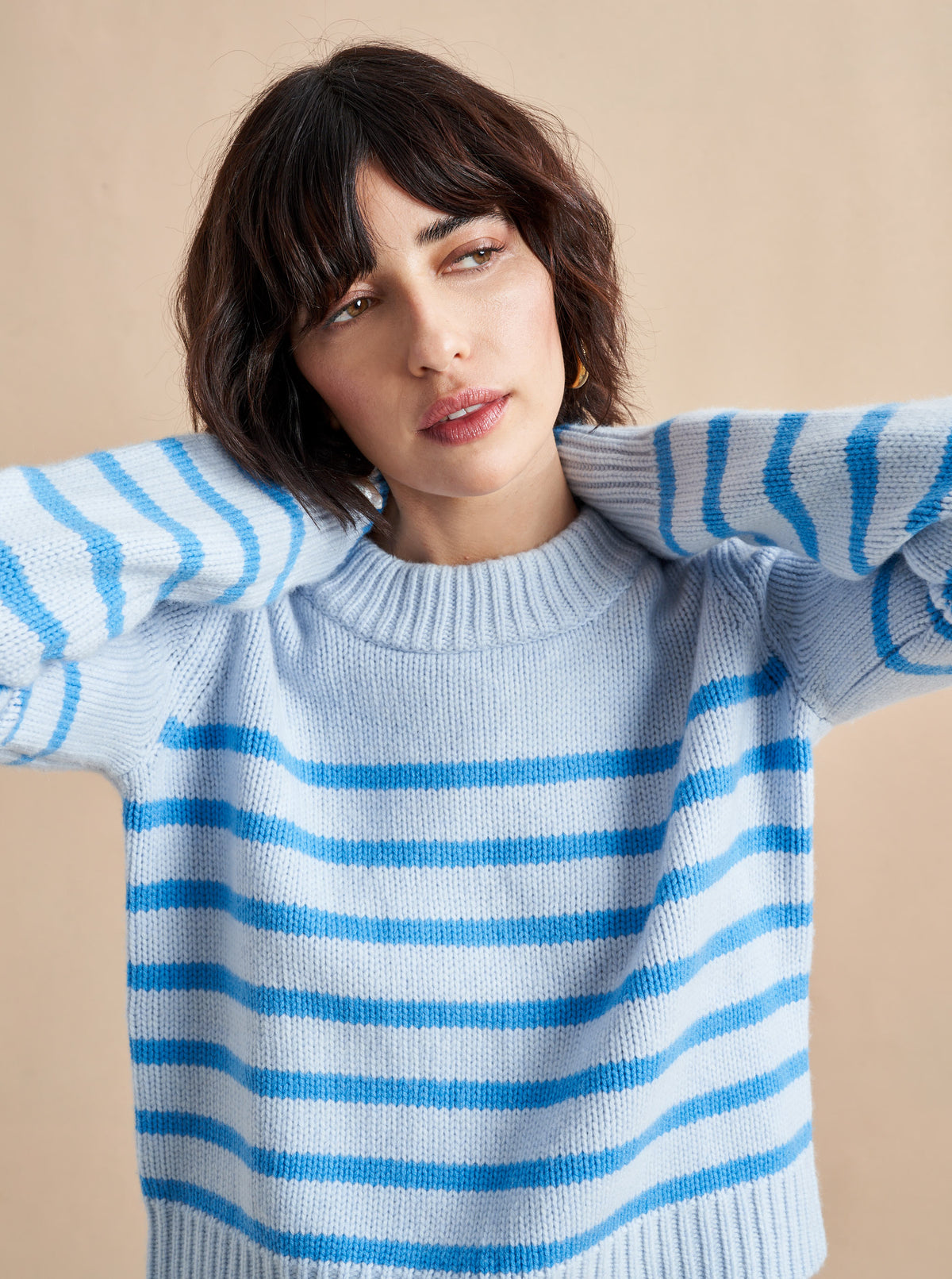 Get on board with our pale blue with tonal blue stripes, 7-ply wool-cashmere sweater, shrunken and slightly cropped, but as always, comfort and style not mutually exclusive.