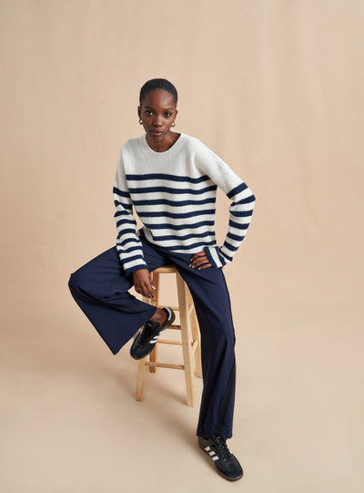 This is it. This is your everyday, never-without, take-with-you-everywhere sweater that will always have your back. Deliciously ribbed cashmere in a loose crewneck and slightly cropped silhouette means you need one in every color for tous les jours. 