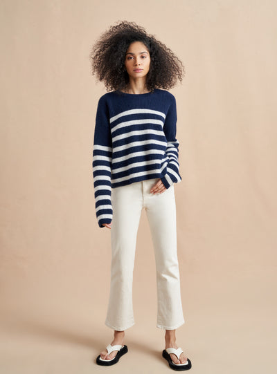 This is it. This is your everyday, never-without, take-with-you-everywhere sweater that will always have your back. Deliciously ribbed cashmere in a loose crewneck and slightly cropped silhouette means you need one in every color for tous les jours. 